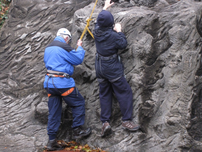 Spud and James rock climbing