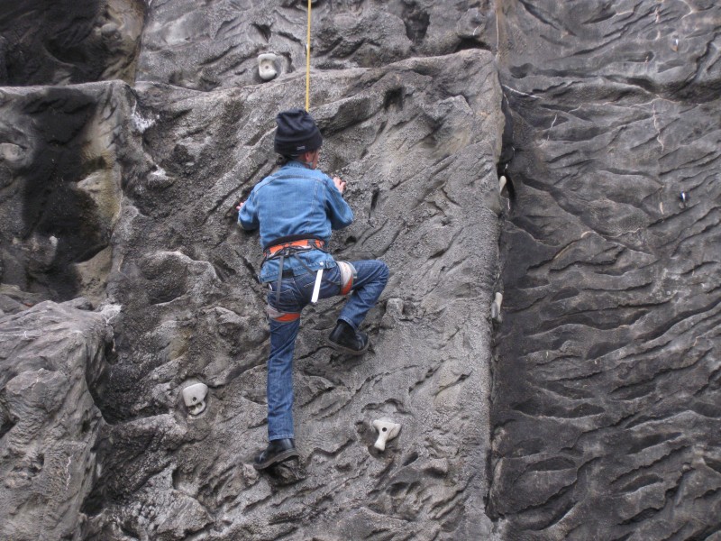 Warren climbing the wall