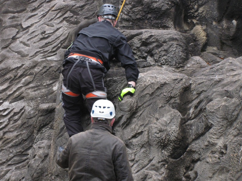 Nick rock climbing wearing MD spectacles