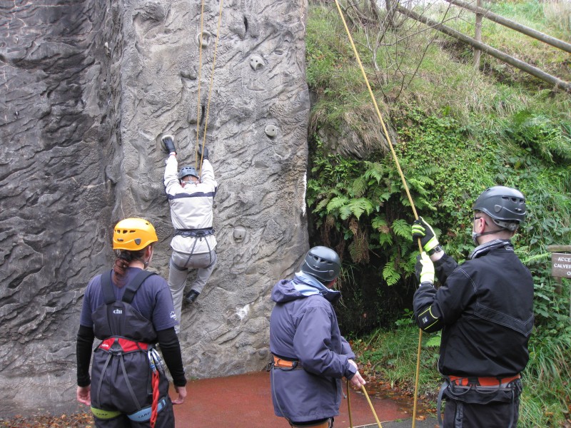 Paul climbing the hardest wall with Warren, June &amp; Nick helping