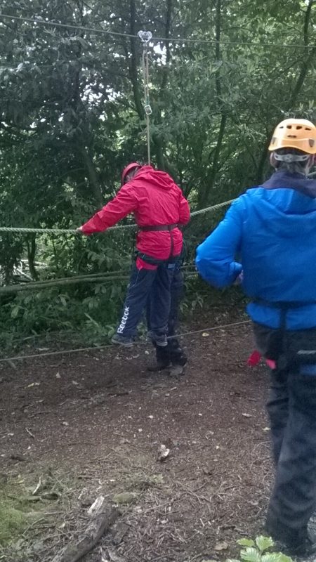 Andrew on the lower rope which was easier. If you pushed the top rope with your hands it dislodged the other members who were on them. Great fun!