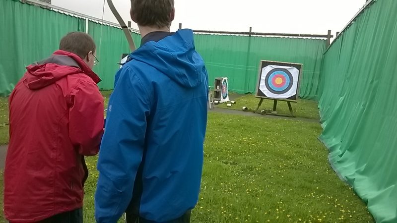 Alun helping Andrew to stay on target.