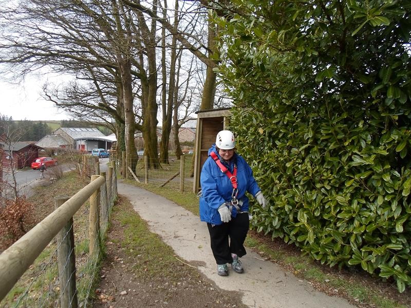 Jayne on her way up the path back from the abseiling.