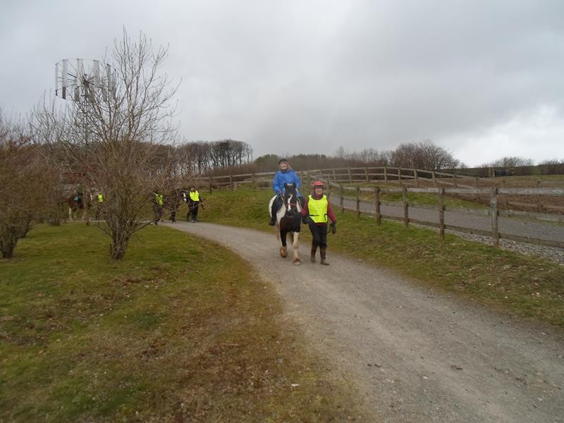 Aileen with Mary, a volunteer, going down the lane