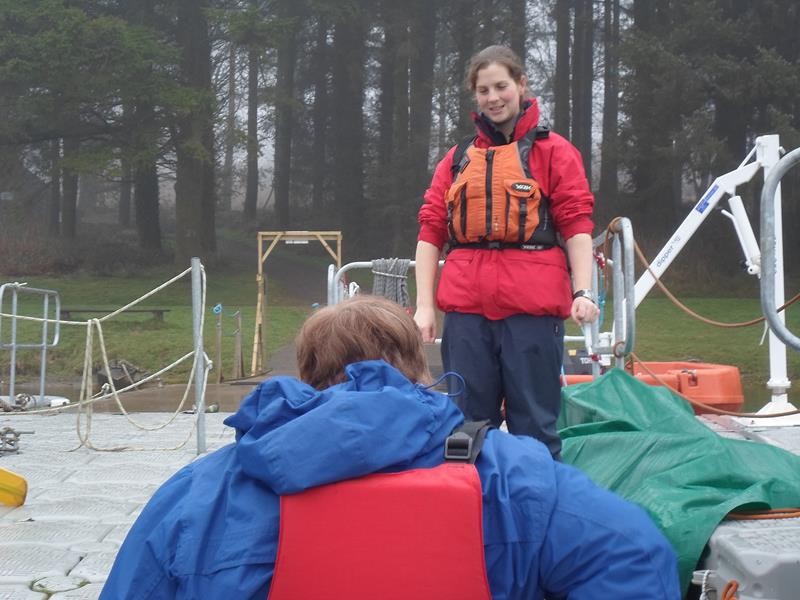 Sophie explaining to Jayne, nicely, that she needs to put her feet up on the side of the canoe to be comfortable!