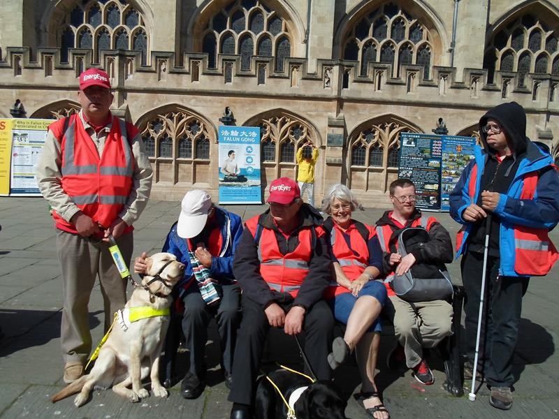 Matthew, Robin, Harry, Ernest, Janet, Andrew and James outside Bath Abbey.