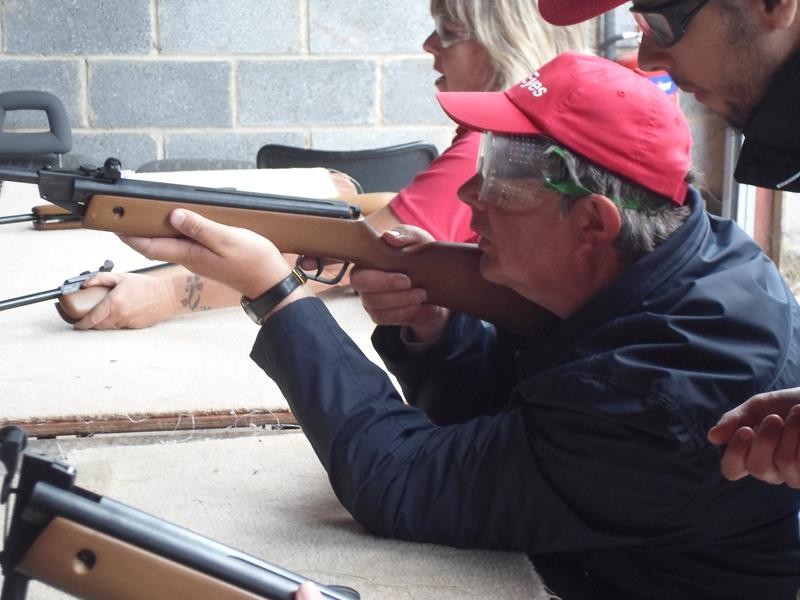 Ernest firing his rifle.