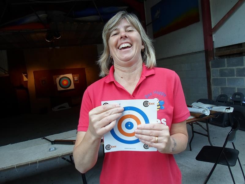 Su showing her &quot;spot&quot; on the target sheet.