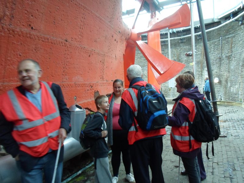 Spud explaining some of the history of the ship to Liam, Michelle, Jean and Phillips not listening at all.