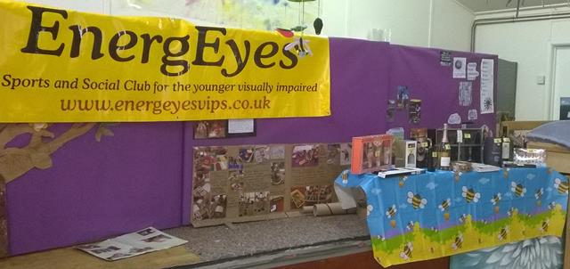 EnergEyes Poster  and table with raffle prizes.