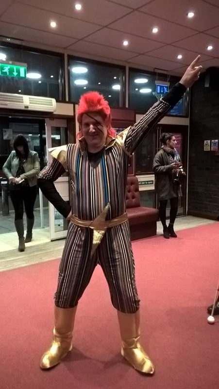 JOHN ALEXANDER POSING AS DAVID BOWIE INSIDE THE ENTRANCE OF THE PLAYHOUSE, WESTON-SUPER-MARE. WHAT A STAR!!!