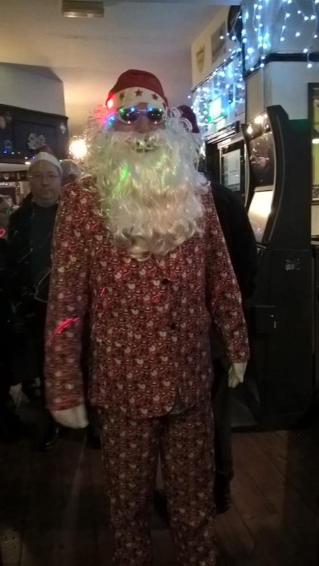 JOHN ALEXANDER DRESSED AS SANTA CLAUSE