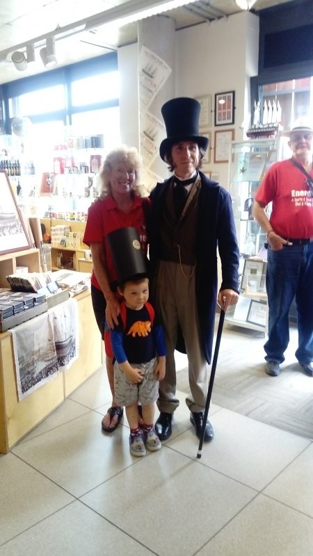 AILEEN, MAX &amp; ISAMBARD KINGDOM BRUNEL INSIDE THE ENTRANCE TO THE SS GREAT BRITAIN SHOP.