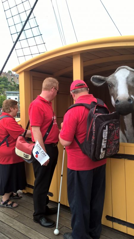 JAYNE, PAUL &amp; ERNEST LISTENING TO THE COWS AND THE PIGS ON THE DECK OF SS GREAT BRITAIN