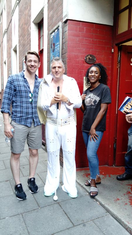 JOHN AT THE STAGE DOOR WITH TWO OF THE CAST.