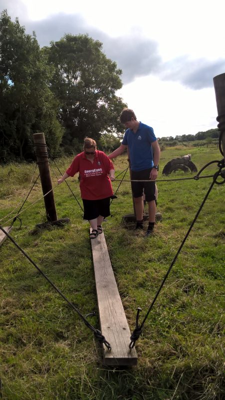 JAYNE BEING HELPED BY ALISTAIR ACROSS THE PLANK. IT IS VERY WOBBLY!!