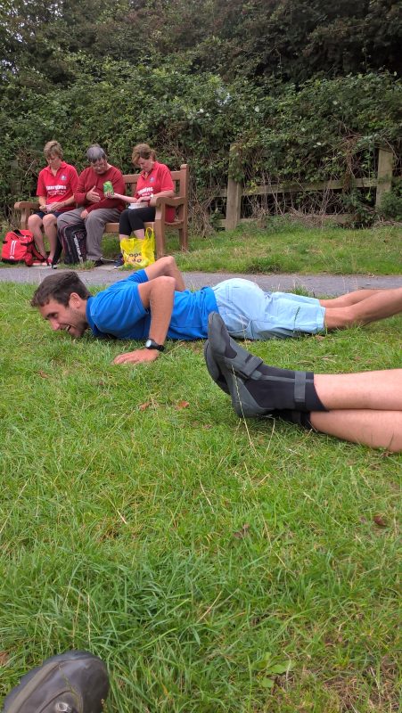 THIS IS OUR ENTERTAINMENT DURING OUR LUNCH BREAK. OLLIE DOING GYMNASTICS, WELL, SORT OF! JEAN, ERNEST &amp; SU SAT ON BENCH.