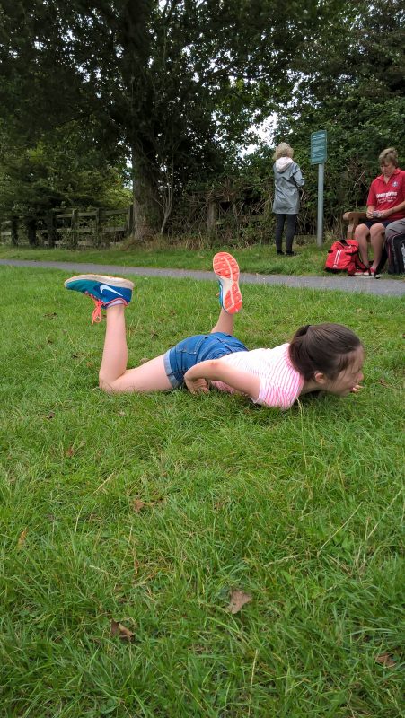 HOLLY IN A HEAP DOING GYMNASTIC.