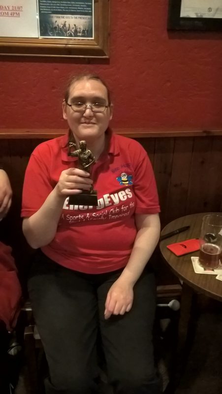 KIMBY, LADIES TOP SCORER HOLDING OUR DARTS TROPHY