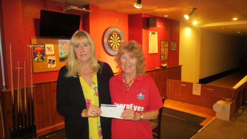 SARAH GIBSON PRESENTING AILEEN, CHAIRMAN, WITH A CHEQUE FOR MONIES RAISED AT HUTTON FETE AUGUST 2019