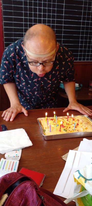 JAMES BLOWING OUT HIS CANDLES AT OUR AGM, 3RD AUGUST, WHICH CONICIDED WITH HIS BIRTHDAY