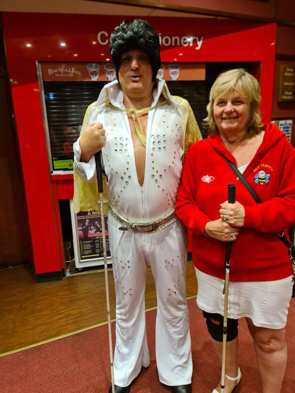 John, dressed as Elvis and Julie